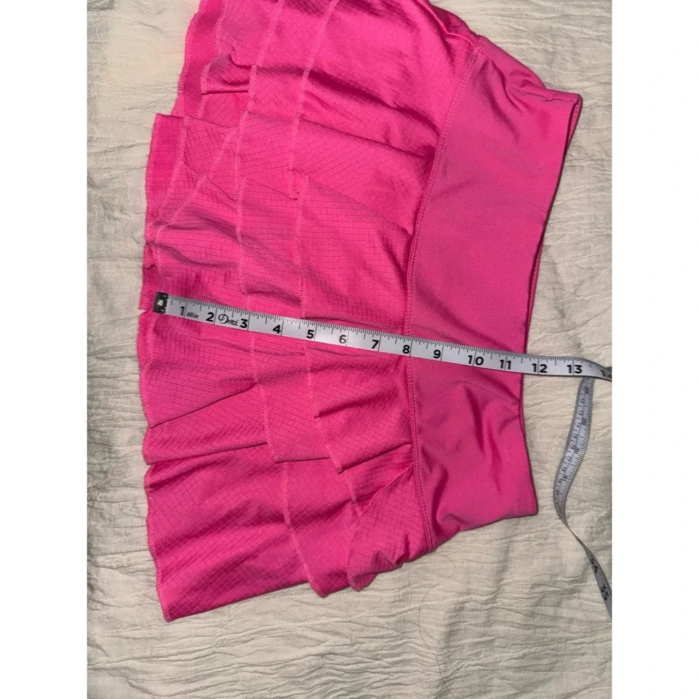 Lucky In Love pink ruffled‎ skort with undershorts and a 4